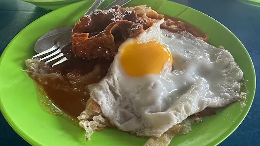 Roti Canai Mamu Kader — signature dish