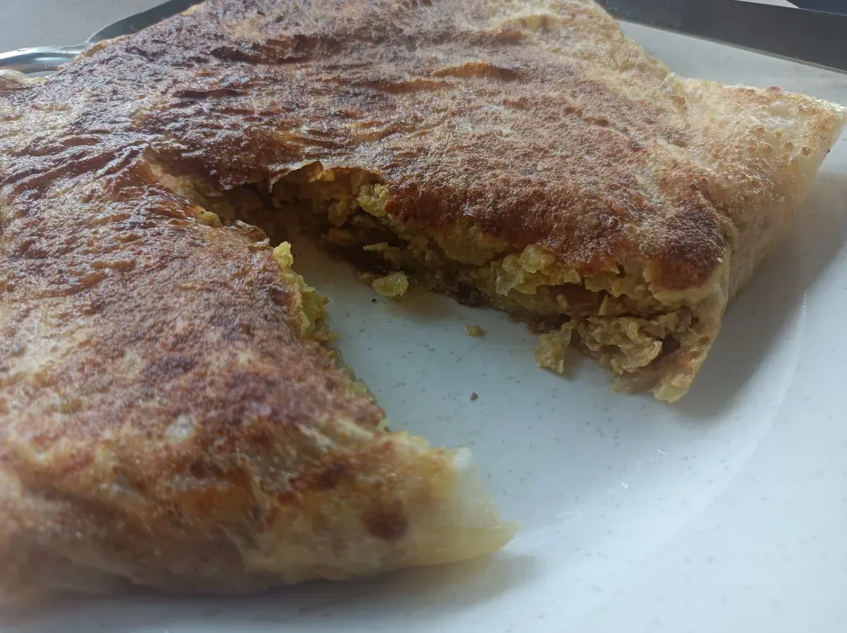 Roti Canai Rizqi — signature dish