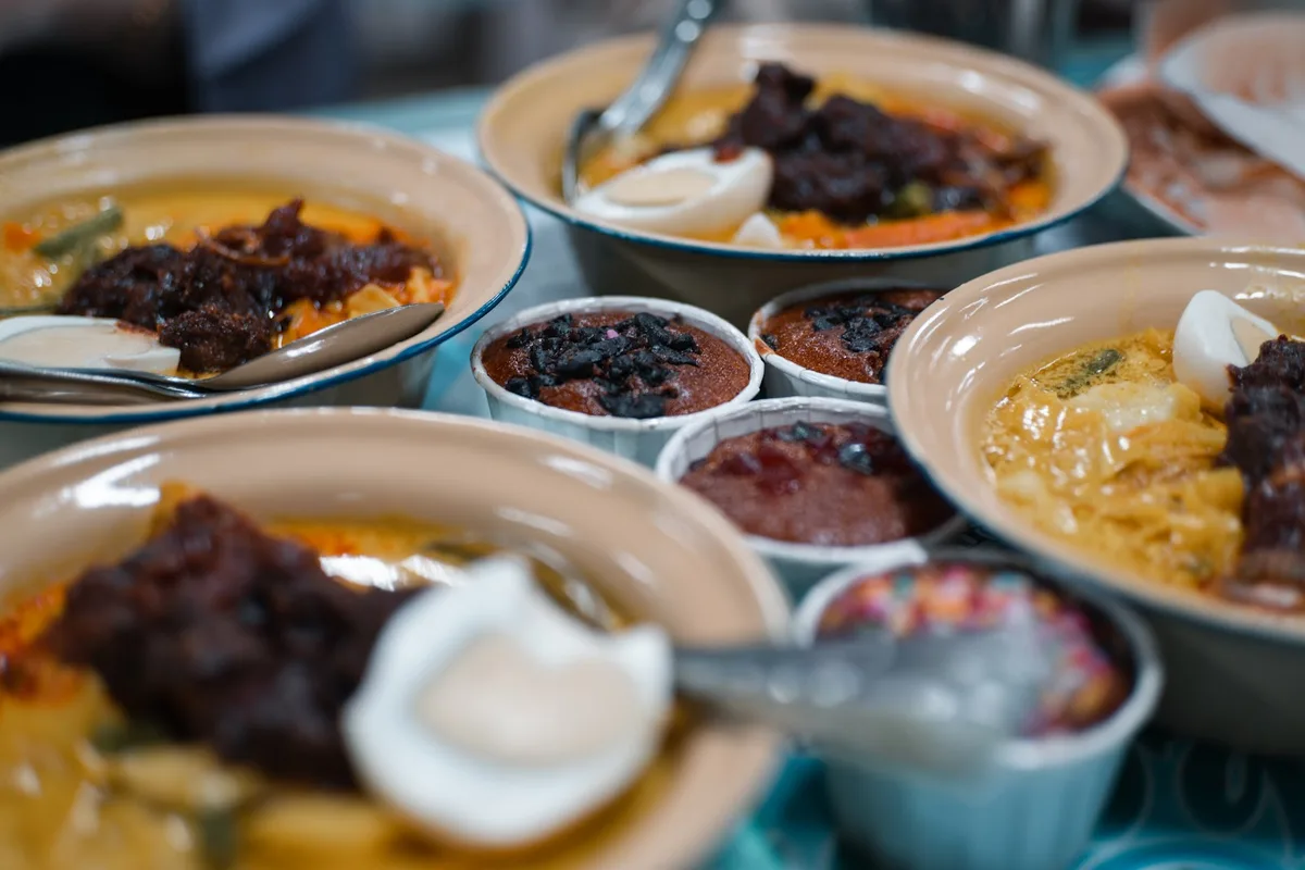 Lontong bowls with sambal sides