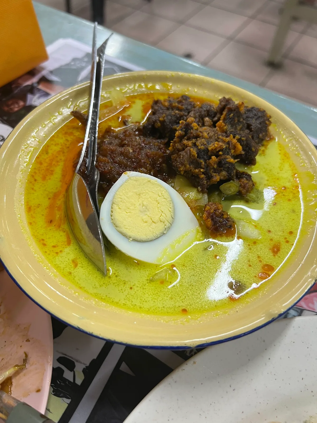 Lontong with beef rendang