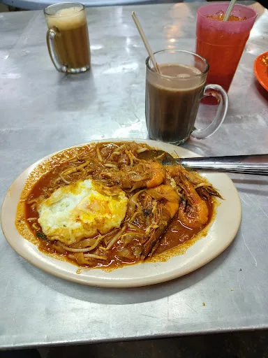 Sany Char Koay Teow — signature dish