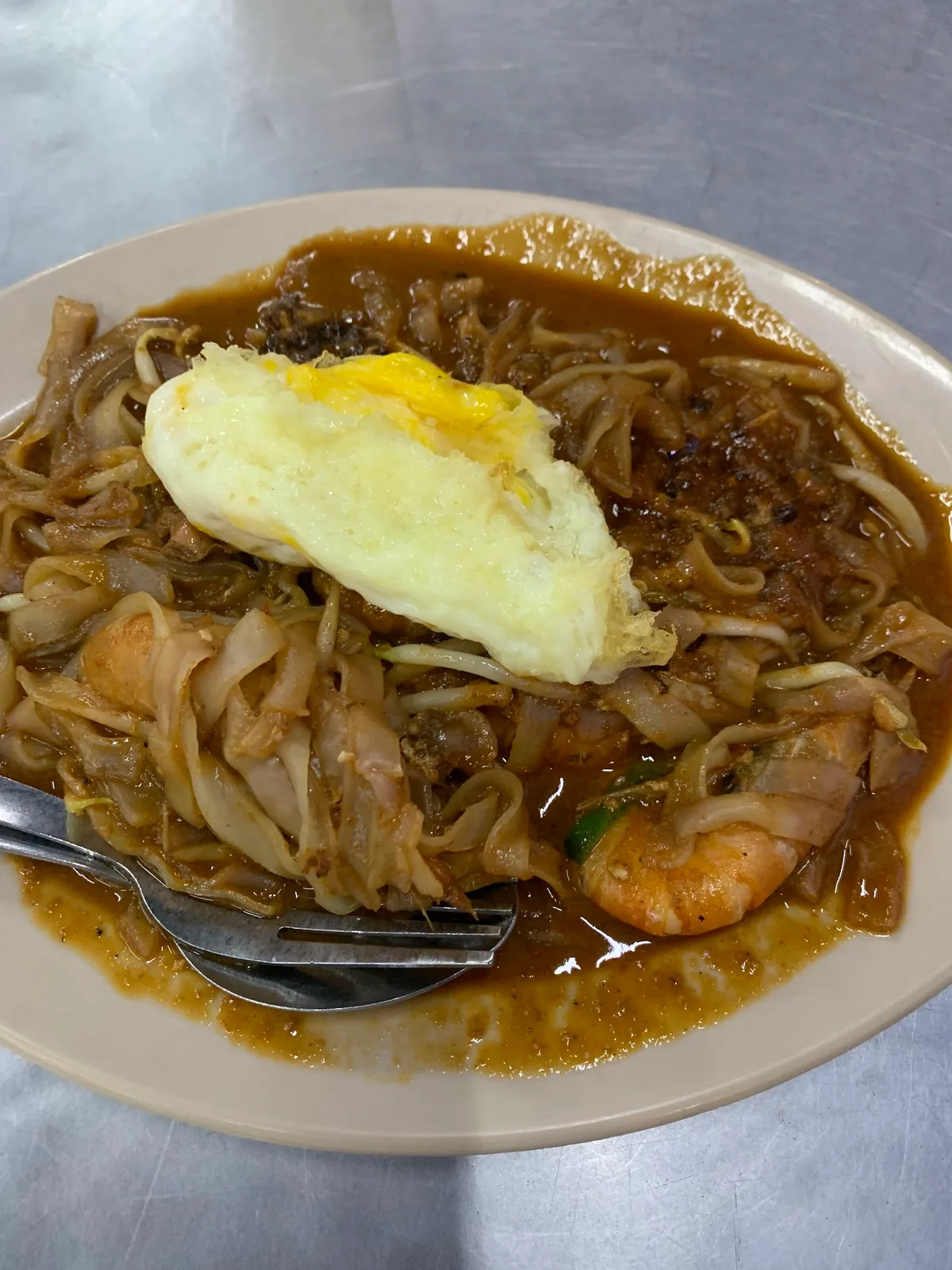 Char koay teow with fried egg