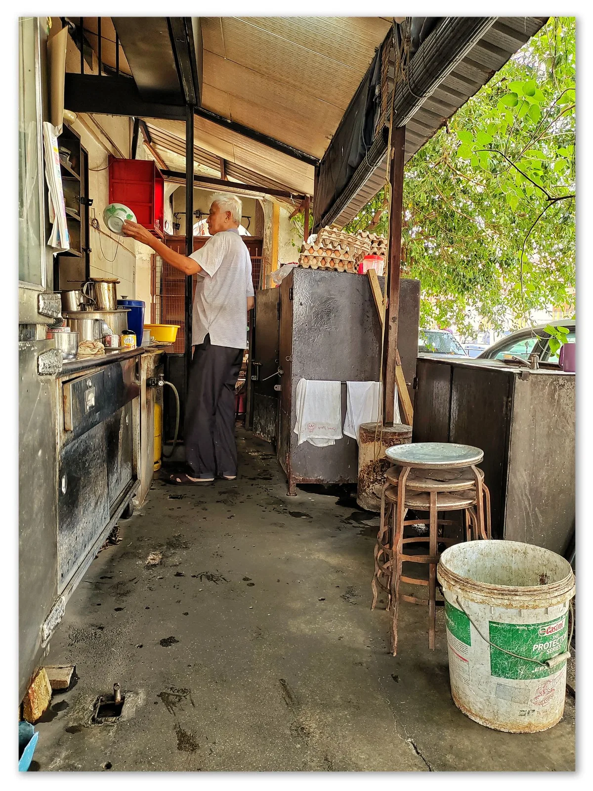 The kopi uncle at his stall