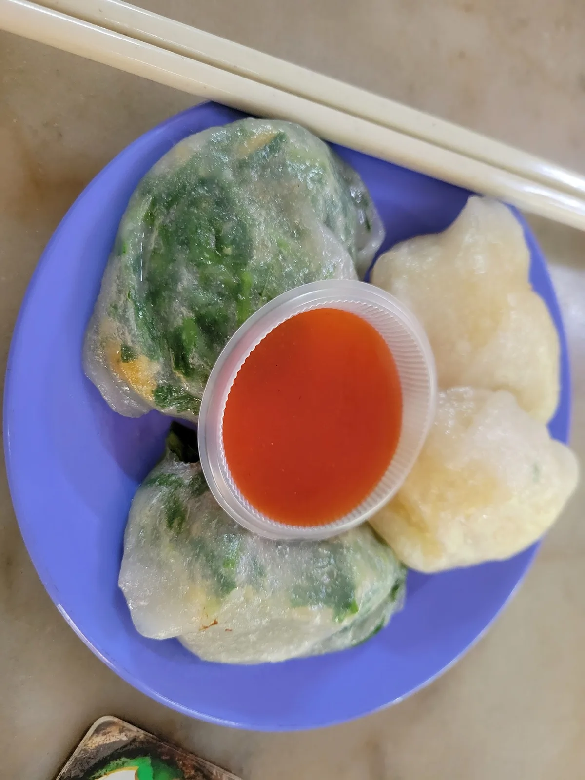 Chai kuih with chilli sauce