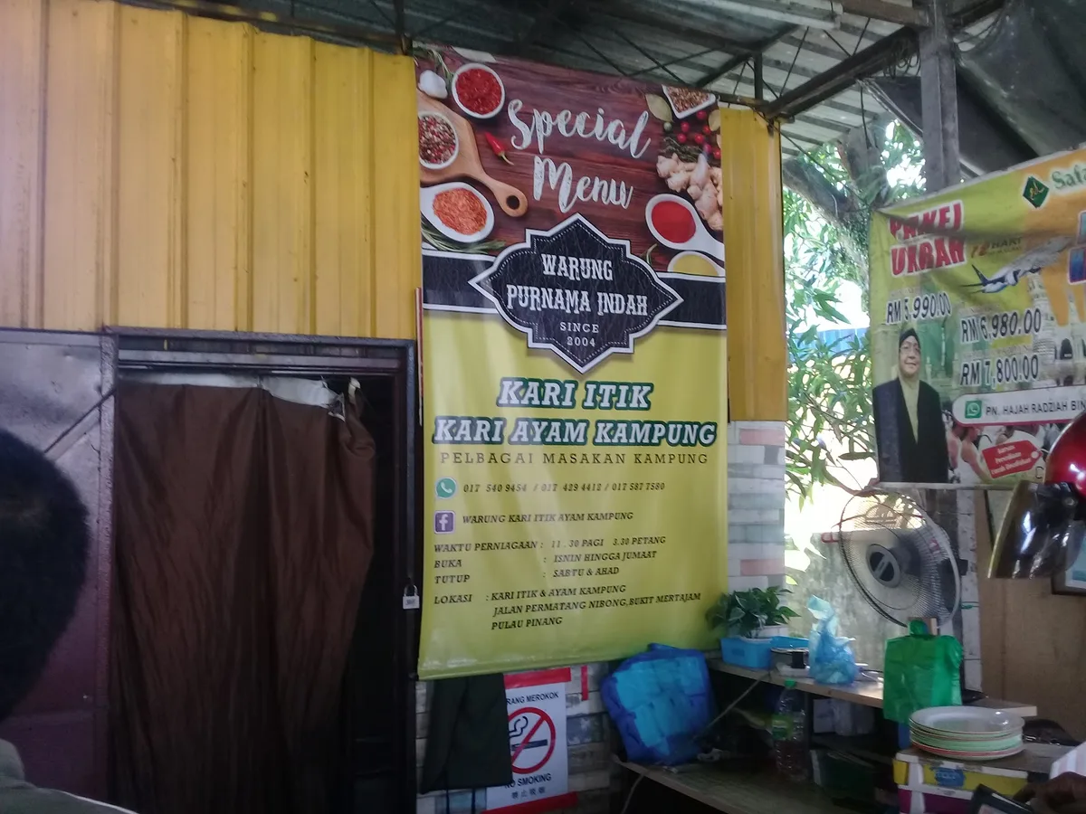 Banner: Warung Purnama Indah since 2004, kari itik and kari ayam kampung