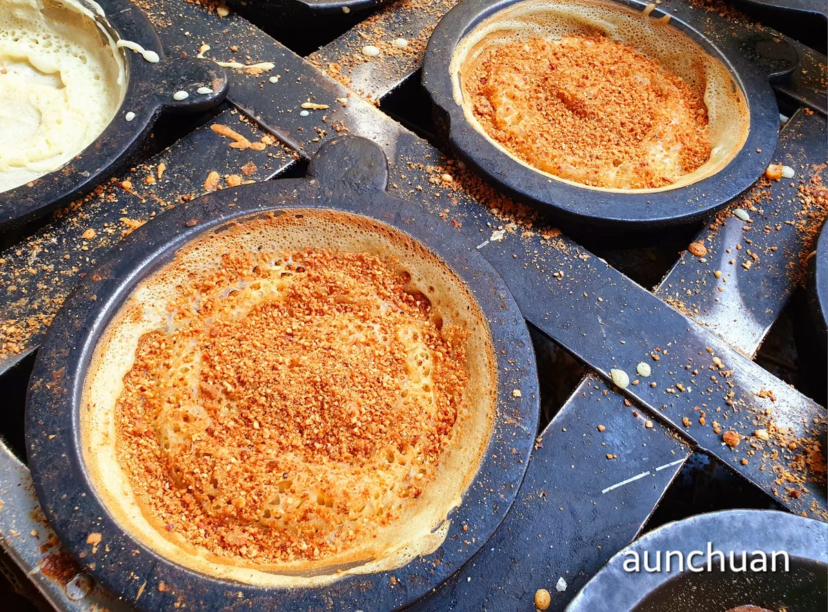 Pancakes cooking on the cast-iron griddle