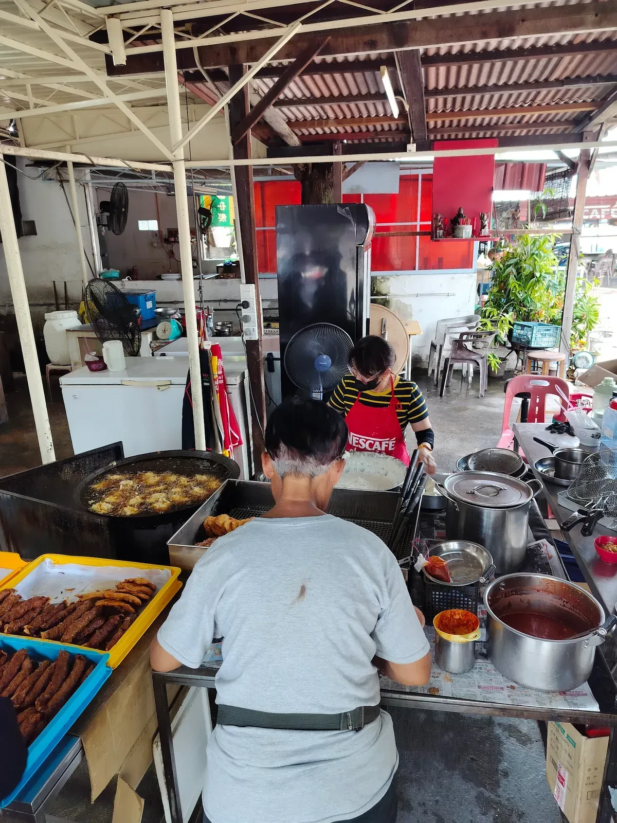 Tan Jetty Prawn Fritters & Loh Bak — signature dish