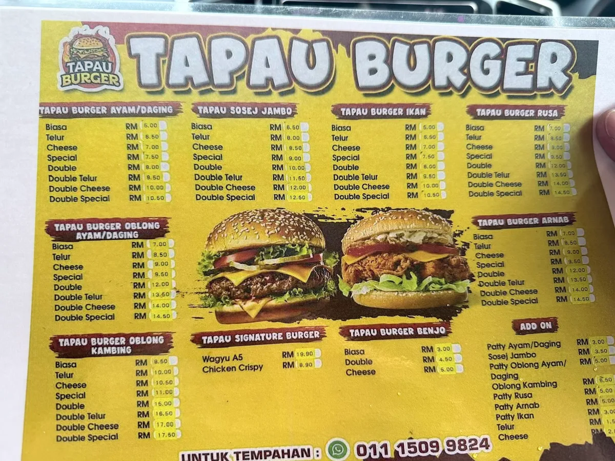 The Tapau Burger menu board