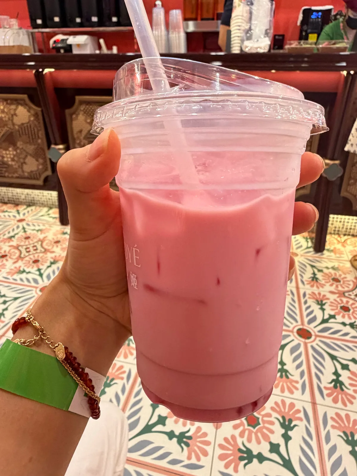 Bandung rose drink in hand