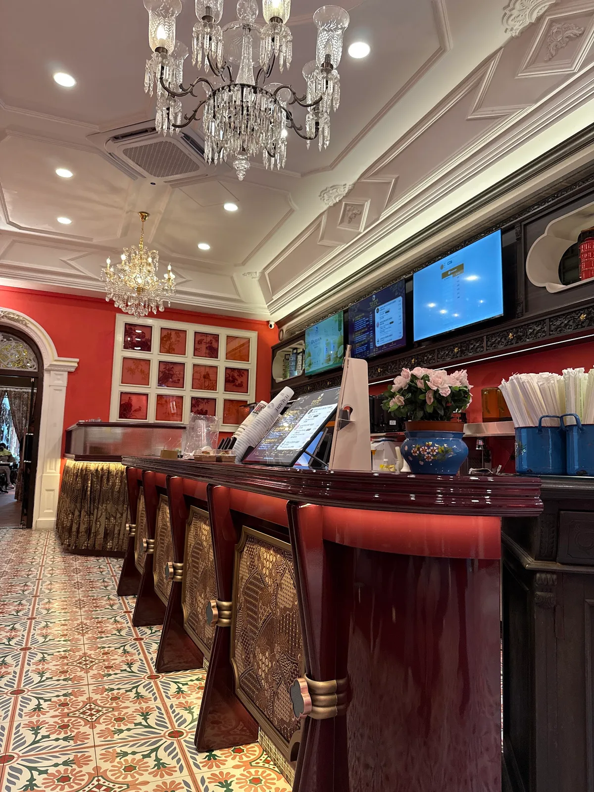 Peranakan-styled tea bar interior with chandelier