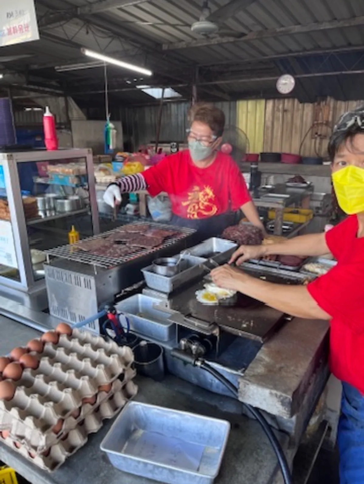 Buns and eggs on the griddle