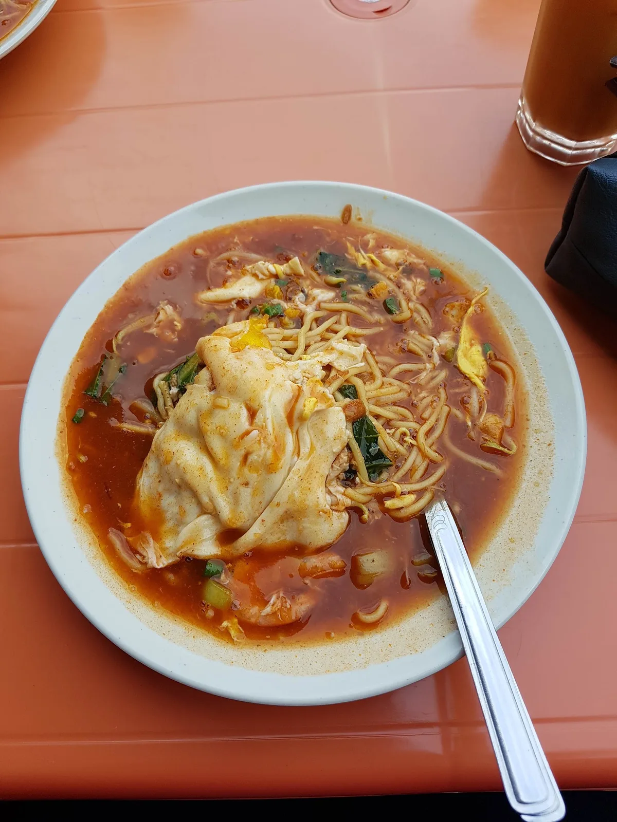 Bowl of mee jawa with egg