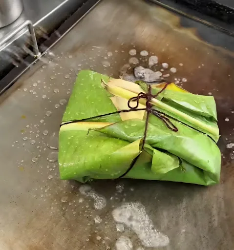 Wakzee Nasi Lemak — signature dish