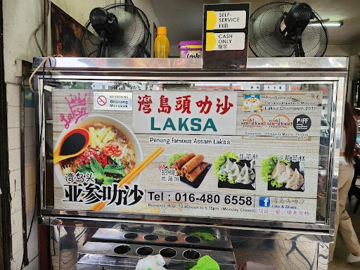 Wan Dao Tou Assam Laksa — signage