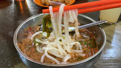 Wan Dao Tou Assam Laksa — signature dish