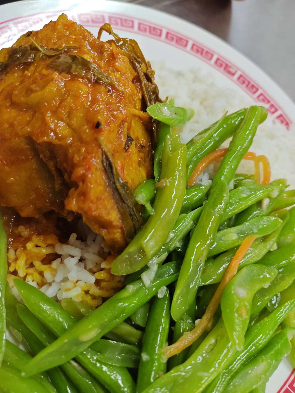 Curry fish and long beans over rice