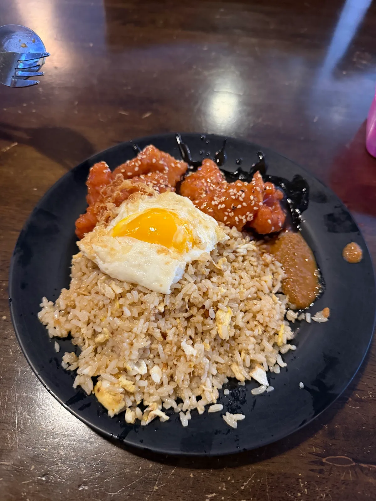 Fried rice with fried egg and chicken